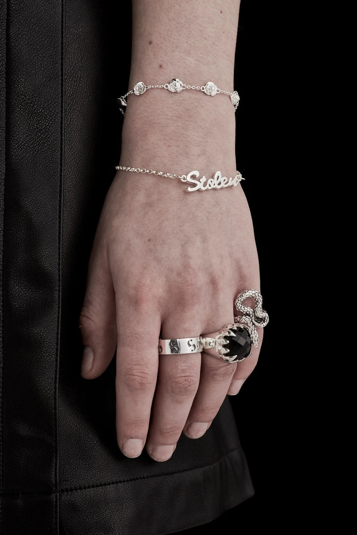 Stolen Silver Script Bracelet