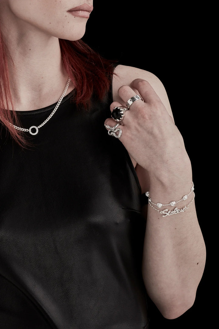 Stolen Silver Script Bracelet