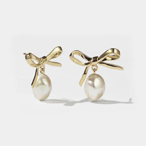 MEADOWLARK 23CT GOLD PLATED BOW PEARL STUDS