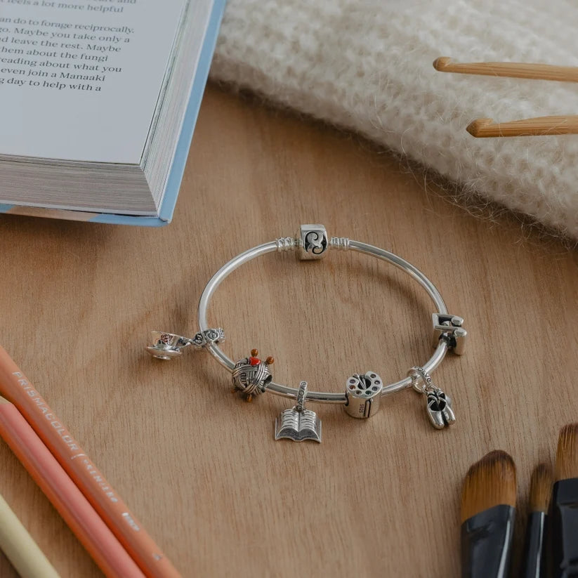 Evolve Book (Escape) Dangling Charm