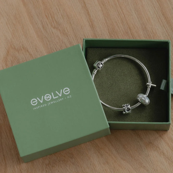Evolve Cross (Faith) Charm