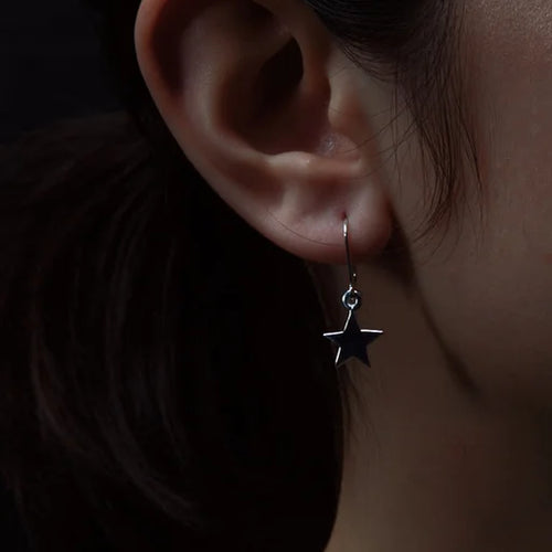 KAREN WALKER SILVER STAR EARRINGS