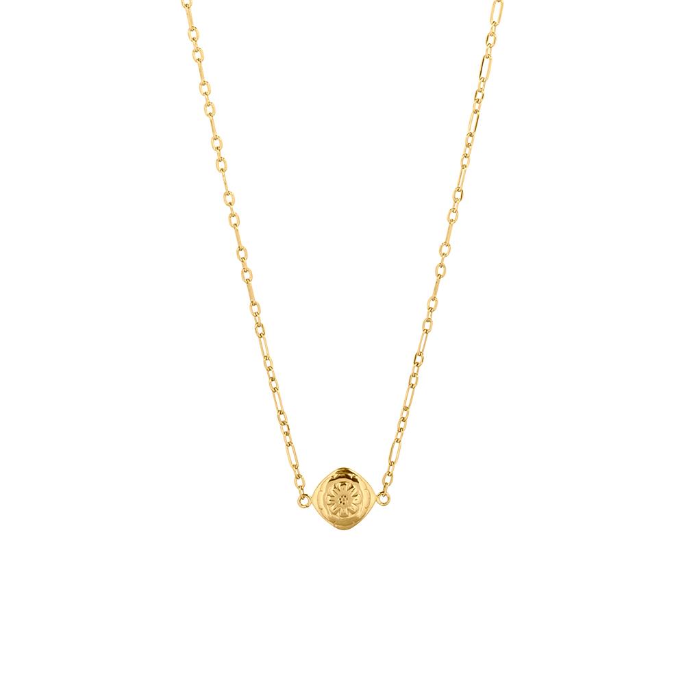 A gold plated necklace with a floral design pendant in the center