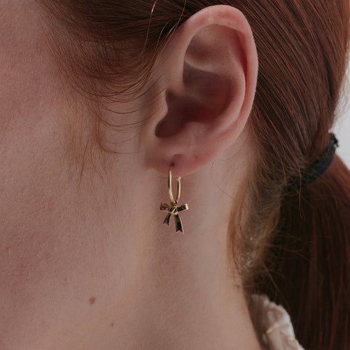 Aggregate more than 220 gold bow earrings super hot